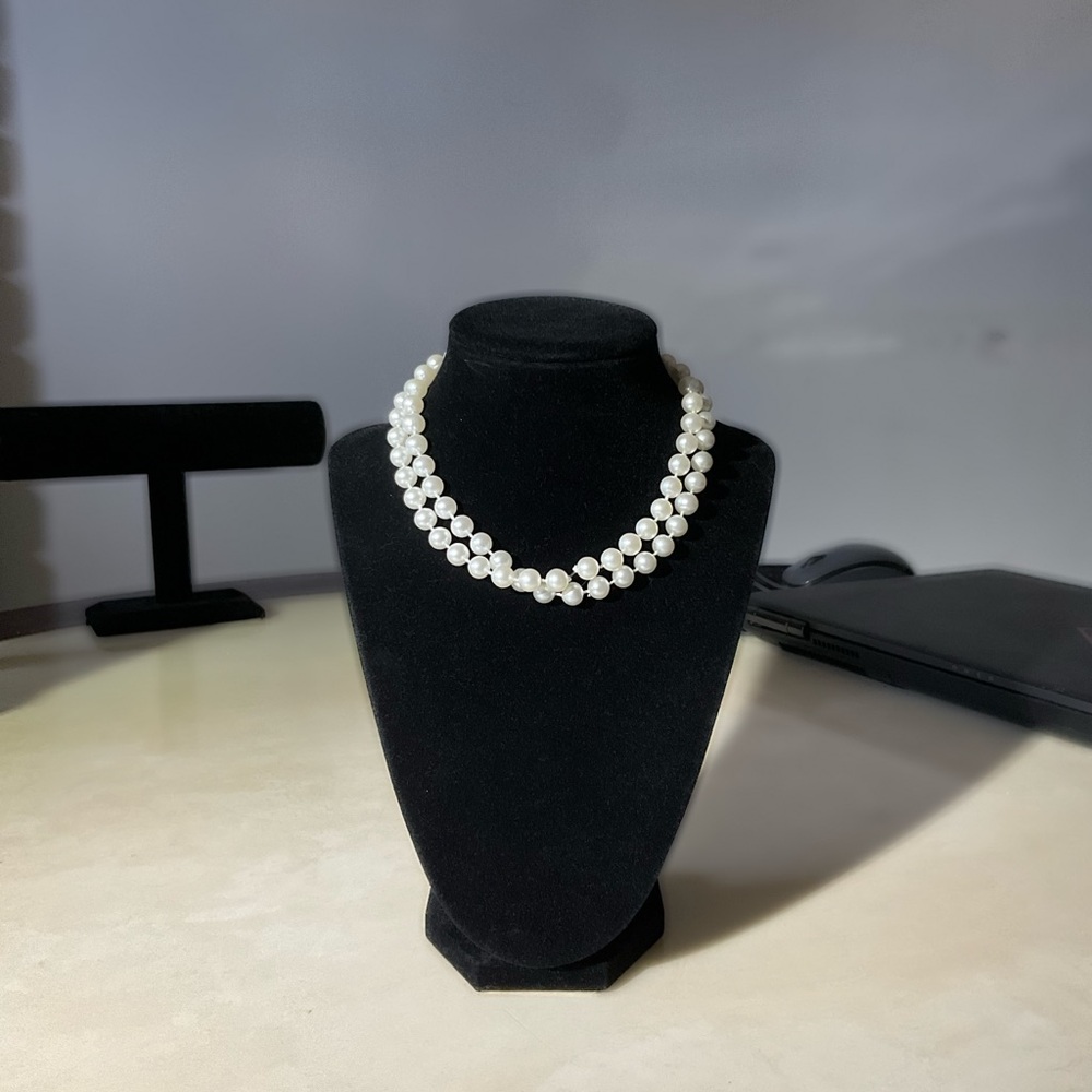 Pale white faux pearl necklace